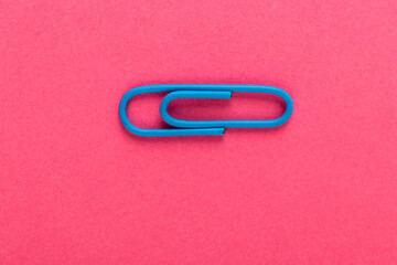 Colored paper clip.