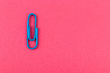 Colored paper clip.