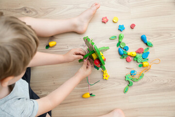 Fine-motoric skils. Stringing Beads Toys for infants and toddlers. Threading Activity for Children....