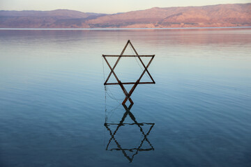 The Star of David known in Hebrew as the Shield of David or Magen David, taken on the dead sea....