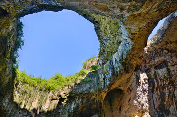 Cave with holes in the ceiling - Devetashka , Bulgaria
