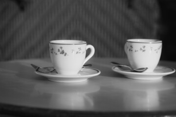 Two cups of espresso coffee on a coffee shop terrace from Paris, France.