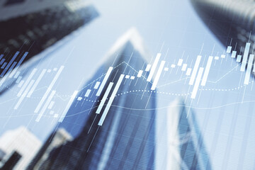 Double exposure of abstract financial graph on office buildings background, financial and trading...