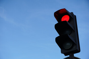 traffic lights. traffic light caught on the red color for cars. stop.