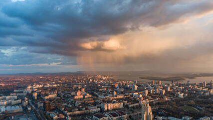 Obraz premium Khabarovsk city top view sunset beautiful clouds in the rain