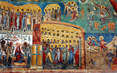 Voronets Monastery, Suceava County, Moldavia, Romania: One of the famous painted churches of Moldavia. Detail of the colorful medieval frescos on the Saint George Church.