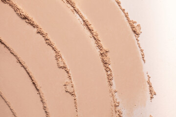 Bronzer or blusher and compact powder beige brown nude smudge white isolated background - obrazy, fototapety, plakaty