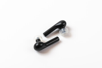 wireless earphones on a white background