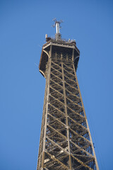 Eiffel Tower from Paris, photographed during a cloudy day from the spring of 2022, landmark in France.