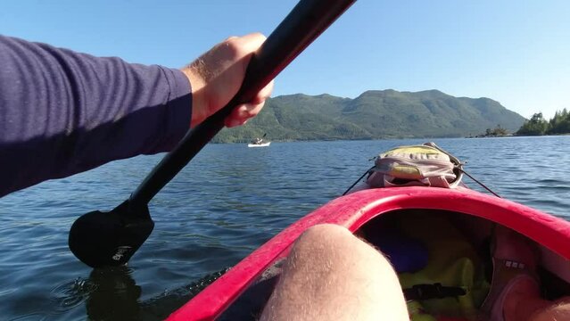 Kayaker on Kennedy Lake, Laylee Island, Vancouver Island, Canada