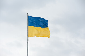 Ukrainian national flag on the sky backgroud