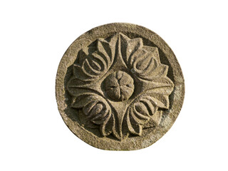 A stone element of facade decor. Rosette with flower shape on the white background
