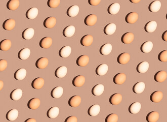 Easter egg pattern idea, spring season and holiday concept. Monochromatic brown background, retro flat lay composition.