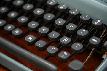 detail of a black vintage typewriter close up on keys