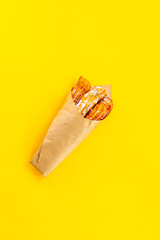 Fast food sweets - churros in paper bag