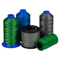 Spools of thread, bobbins with threads of different colors and sizes, insulated on a white background