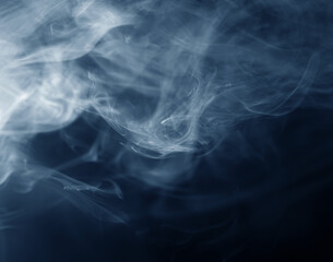 Smoke over black background. Fog or steam texture.