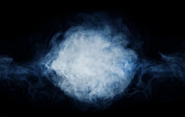 Abstract smoke texture over black. Fog in the darkness.