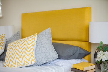 Modern bed detail yellow, white and grey