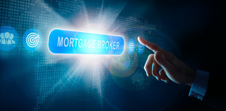 A businessmans hand selecting a Mortgage Broker business word concept on a computer display.