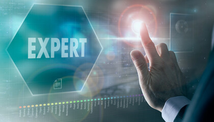 A businessman controlling a futuristic display with a Expert business concept on it.