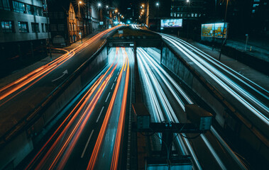 Fototapeta na wymiar Long Exposure Light Trails of City Cars at Night