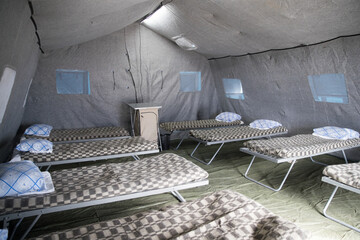 new tents for refugees from Ukraine.mobile building, temporary refugee camp.refugee camp.isolation...