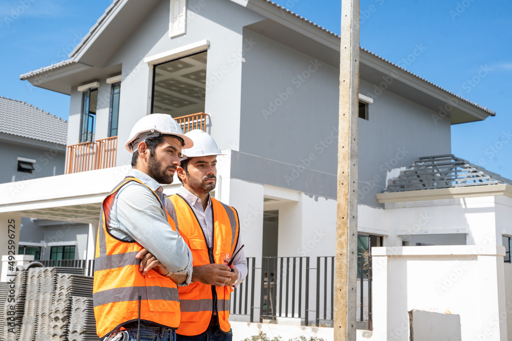 Poster Engineer working on construction building site,Architects discussing project of building outdoors.