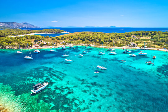 Pakleni otoci Marinkovac island turquoise bay yachting destination aerial view, Hvar island