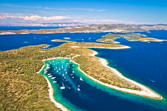 Aerial panoramic view of Palmizana, sailing cove and turquoise beach on Pakleni Otoci islands
