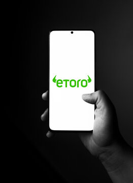 Assam, india - February 19, 2022  eToro logo on phone screen stock image
