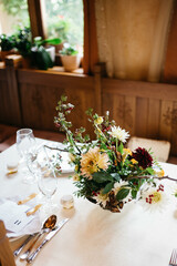 Festive table setting in the restaurant. Luxury catering at celebrations.