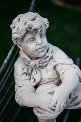 Fototapeta na wymiar Little boy figure. Used for decoration. Steel, background, doll stock photo.