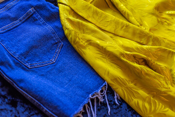  Yellow blue trend in clothes. Spring - summer collection Fashionable color of peace, close up details 