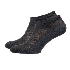 A pair of fabric socks stands on a white isolated background. Volumetric socks on a transparent mannequin.