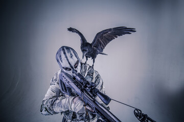 fighter with a crossbow and a raven