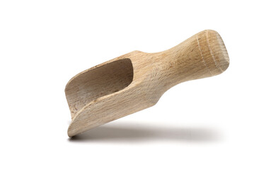 Closeup wooden scoop shovel rustic white background