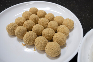 Korean food Gyeongdan rice ball cake on a white dish, South Korea.