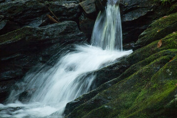 Fototapeta premium Cascading waterfall with rocks
