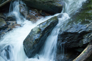 Cascading waterfall with rocks