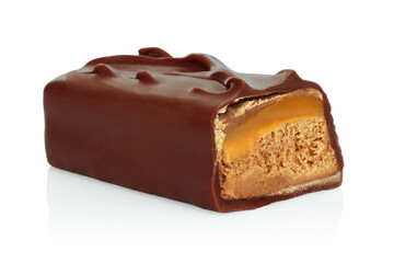 Broken chocolate bar with stretching caramel isolated on white background