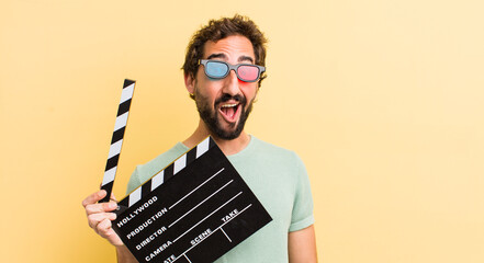 young man with a clapper