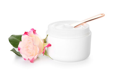Jar with natural cosmetic cream and rose flower isolated on white background