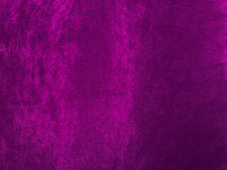 Purple velvet fabric texture used as background. Empty purple fabric background of soft and smooth textile material. There is space for text..