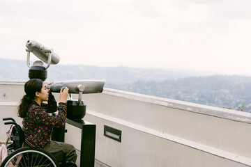 Young woman in a wheelchair sightseeing in los angeles