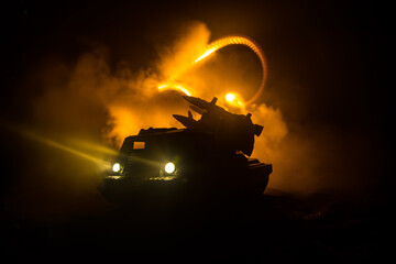 Rocket vehicle ready to attack on cloudy war Background. Selective focus