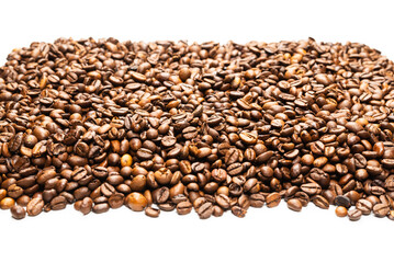 Coffee beans on a white background. Top view.