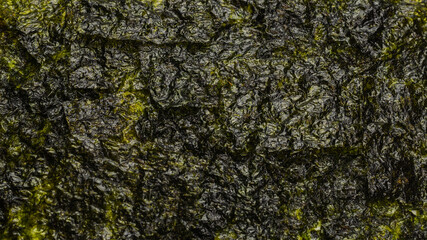 Tasty nori seaweed isolated on white.