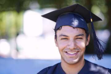 Ready for the future. Portrait of a smiling graduate man.