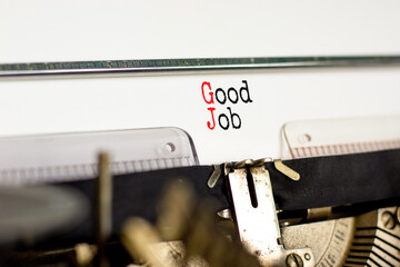 GJ good job abbreviation symbol. Concept words GJ good job on white paper typed on retro...
